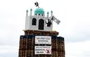 Replica mosque burned in Northern Ireland as police investigate hate crime